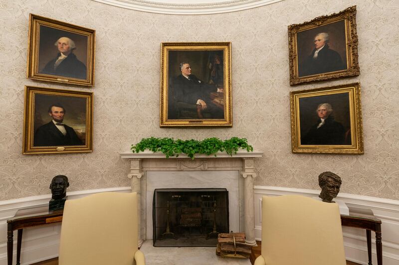 A painting of former President Franklin D. Roosevelt over the mantle of the fireplace is seen at the newly decorated Oval Office of the White House. AP Photo