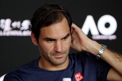 epa07303001 Roger Federer of Switzerland attends a press conference after being defeated in his round four men's singles match against Stefanos Tsitsipas of Greece at the Australian Open Grand Slam tennis tournament in Melbourne, Australia, 20 January 2019.  EPA/DAVID CROSLING AUSTRALIA AND NEW ZEALAND OUT