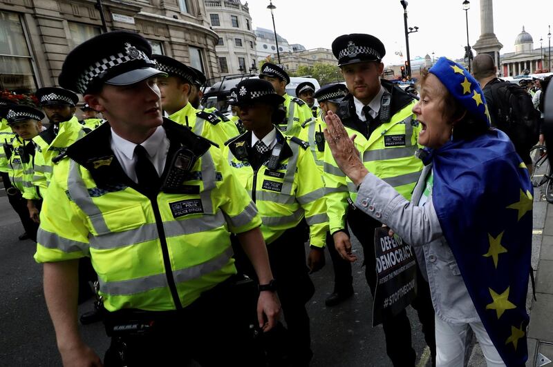 A woman argues with police during an anti-Brexit protest in London, Britain August 31, 2019. REUTERS/Kevin Coombs