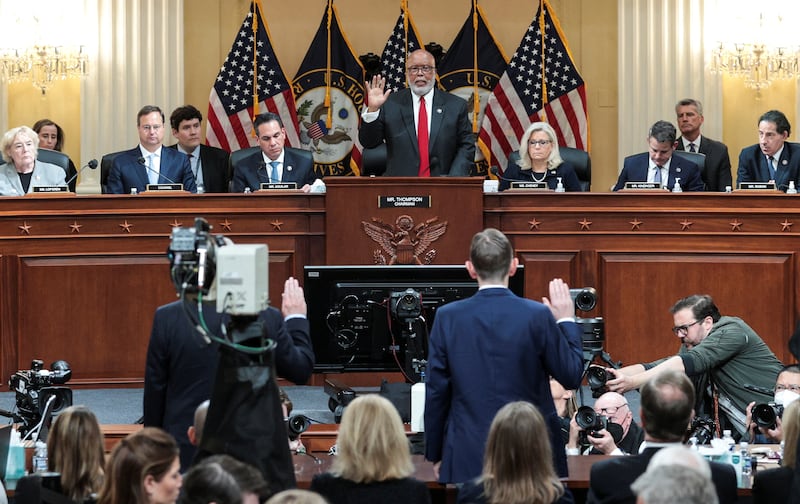 Chairman Bennie Thompson swears in J Michael Luttig, former US federal judge and adviser to former vice president Mike Pence, and Greg Jacob, former counsel to Mr Pence, during the third public hearing of the US House committee on January 6. Reuters