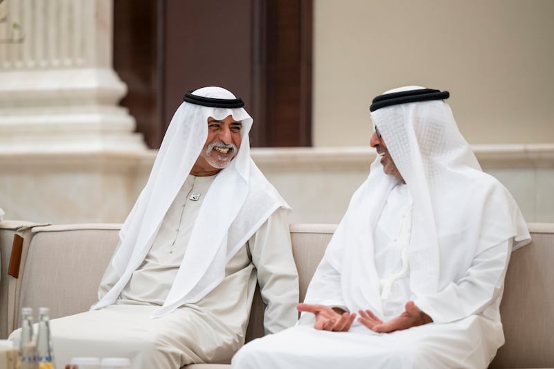 Sheikh Nahyan bin Mubarak, Minister of Tolerance and Coexistence, speaks with Sheikh Hamed bin Zayed. Abdulla Al Bedwawi / UAE Presidential Court
