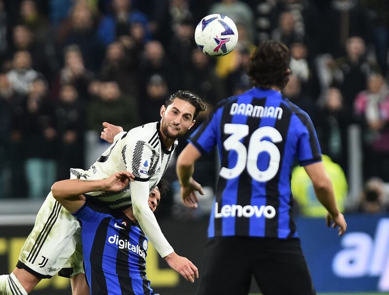Juventus' Adrien Rabiot in action with Inter Milan's Lautaro Martinez and Matteo Darmian. Reuters