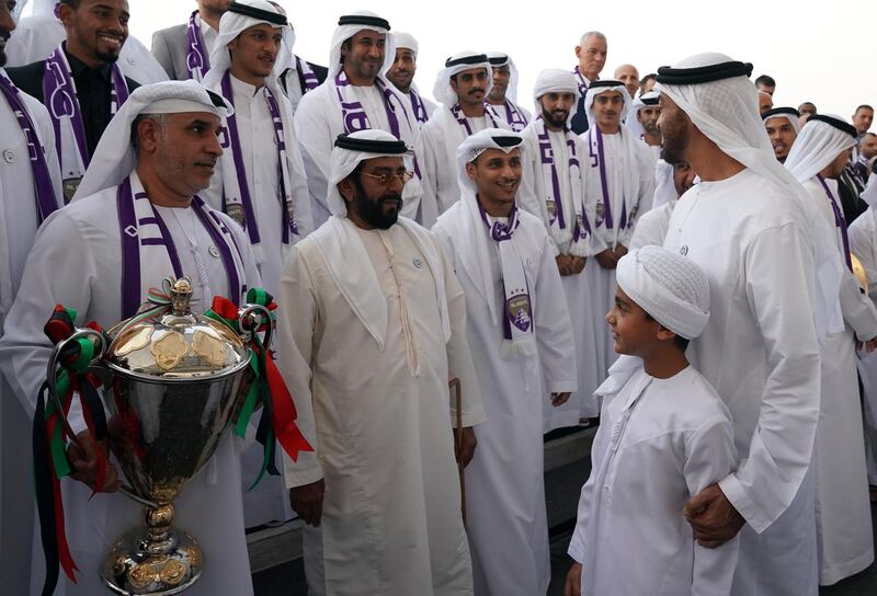 ABU DHABI, UNITED ARAB EMIRATES - October 01, 2018: HH Sheikh Mohamed bin Zayed Al Nahyan Crown Prince of Abu Dhabi Deputy Supreme Commander of the UAE Armed Forces (R), speaks with members of Al Ain Football Club, during a Sea Palace barza. Seen with HH Sheikh Tahnoon bin Mohamed bin Tahnoon Al Nahyan (2nd R) and HH Sheikh Tahnoon bin Mohamed Al Nahyan, Ruler's Representative in Al Ain Region (2nd L). 


( Mohamed Al Hammadi / Crown Prince Court - Abu Dhabi )
---