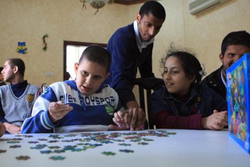 ABU DHABI - 13JAN2011- Children at Ability centre for special needs during their interacting session yesterday in Abu Dhabi. Ravindranath K / The National