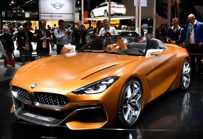 Visitors surround a BMW Z4 Concept during the first media day of the International Frankfurt Motor Show IAA in Frankfurt, Germany, Tuesday, Sept. 12, 2017, which runs through Sept. 24, 2017. (AP Photo/Martin Meissner)