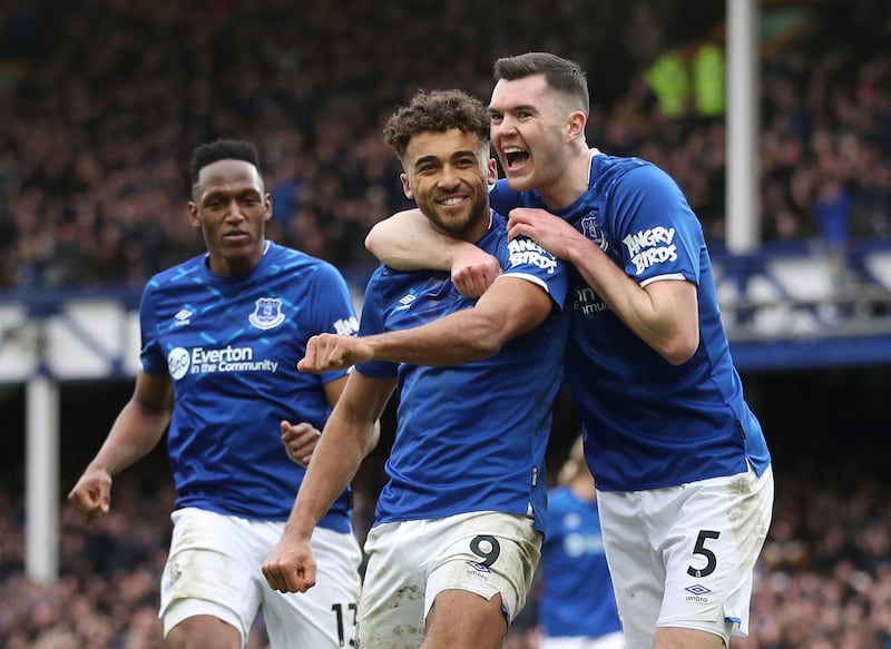 Soccer Football - Premier League - Everton v Crystal Palace - Goodison Park, Liverpool, Britain - February 8, 2020  Everton's Dominic Calvert-Lewin celebrates scoring their third goal with Michael Keane and Yerry Mina                     Action Images via Reuters/Carl Recine  EDITORIAL USE ONLY. No use with unauthorized audio, video, data, fixture lists, club/league logos or "live" services. Online in-match use limited to 75 images, no video emulation. No use in betting, games or single club/league/player publications.  Please contact your account representative for further details.