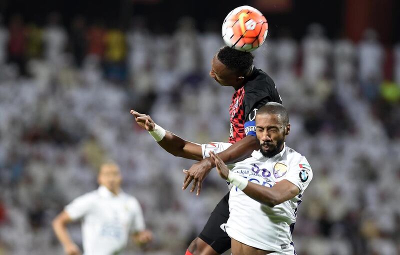 Ahmed Khalil, in red and black, was the matchwinner for Al Ahli against Al Ain. 