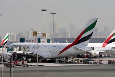 FILE PHOTO: Emirates Airlines aircraft are seen at Dubai International Airport, United Arab Emirates May 10, 2016. REUTERS/Ashraf Mohammad/File Photo