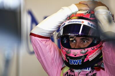 ABU DHABI, UNITED ARAB EMIRATES - NOVEMBER 24: Sergio Perez of Mexico and Force India prepares to drive in the garage during practice for the Abu Dhabi Formula One Grand Prix at Yas Marina Circuit on November 24, 2017 in Abu Dhabi, United Arab Emirates.  (Photo by Mark Thompson/Getty Images)