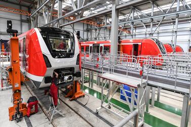 Bombardier employees work on an S-Bahn train at the Bombardier Transportation plant in Bautzen, Germany. France's train manufacturer Alstom  made a €6.2 billion bid for Bombardier's rail business on February 18. EPA