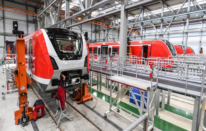 epa08223427 (FILE) - Bombardier employees work on an S-Bahn train at the Bombardier Transportation plant in Bautzen, Germany, 13 May 2019 (reissued 17 February 2020). France's train manufacturer Alstom and Canadian train manufacturer Bombardier on 17 February 2020 issued statements saying they are discussing a possible purchase of Bombardier's train making business by Alstom in a deal valued at some 7 billion USD.  EPA/FILIP SINGER *** Local Caption *** 55189843