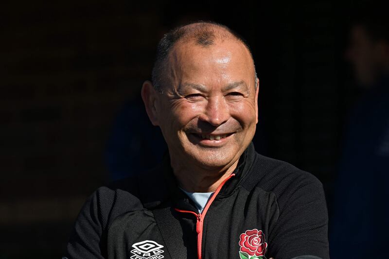 England head coach Eddie Jones smiles as he arrives for the captain's run at Coogee Oval in Sydney. AFP