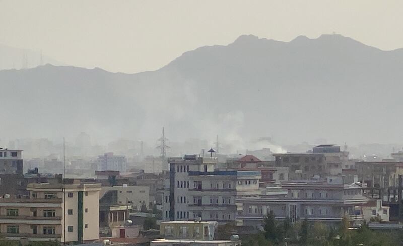 Smoke billows after an explosion near the Hamid Karzai International Airport, in Kabul on August 29, 2021. EPA