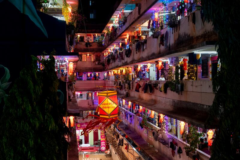 Tower blocks are decorated with lanterns and lights during Diwali in Mumbai. AP