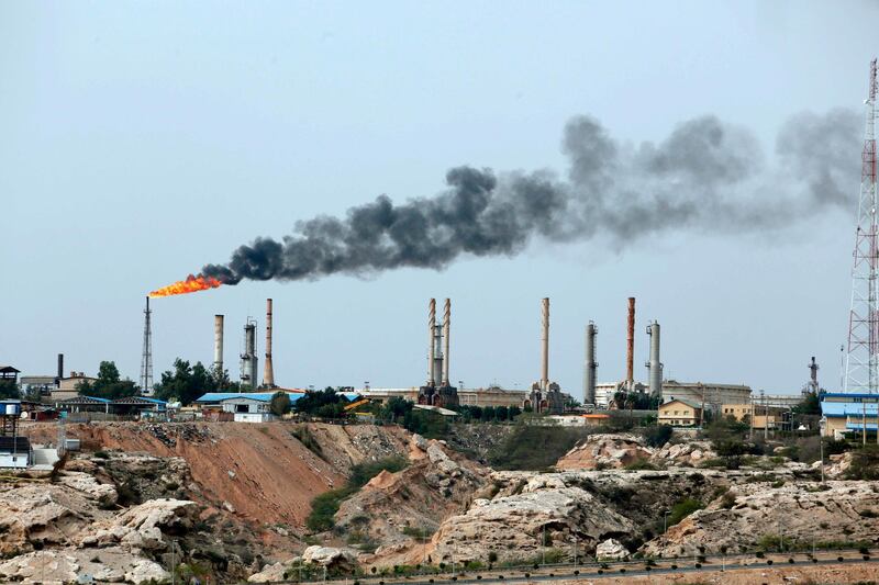 (FILES) This file photo taken on March 12, 2017 shows an oil facility in the Khark Island, on the shore of the Gulf. The United States warned June 26, 2018 that countries around the world must stop buying Iranian oil before November 4 or face a renewed round of American economic sanctions. A senior State Department official warned foreign capitals "we're not granting waivers" and described tightening the noose on Tehran as "one of our top national security priorities."
 / AFP / ATTA KENARE
