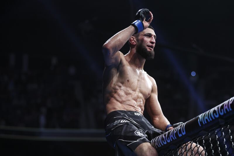 Khamzat Chimaev celebrates after defeating Gilbert Burns in their welterweight bout at UFC 273. Getty
