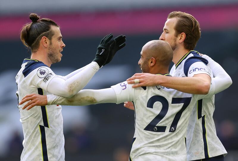 Lucas Moura celebrates with teammates Gareth Bale and Harry Kane. EPA