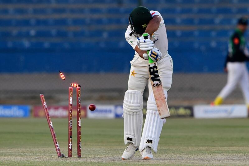 Pakistan's Abdullah Shafique is clean bowled by New Zealand's captain Tim Southee (not pictured) during the fourth day of the second cricket Test match between Pakistan and New Zealand at the National Stadium in Karachi on January 5, 2023.  (Photo by Asif HASSAN  /  AFP)