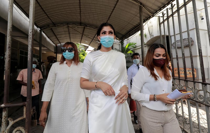 Mrs Sri Lanka 2020 Pushpika De Silva leaves the Chief Magistrates Court after a hearing for her complaint against the former Mrs World Caroline Jurie, after Jurie forcibly removed De Silva's crown at the pageant. Reuters