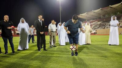 Diego Maradona shows off some skills at Al Fujairah stadium after being announced as the new head coach of the second division side in 2017. AFP