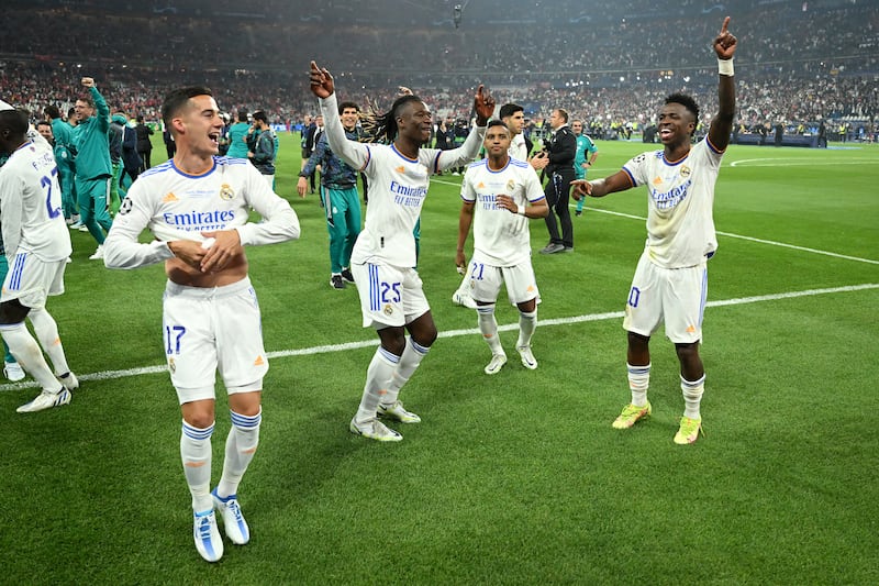 Real Madrid players celebrate after their victory in Paris. Getty