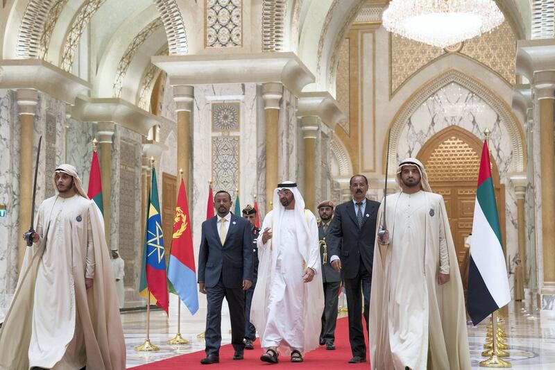 ABU DHABI, UNITED ARAB EMIRATES - July 24, 2018: HH Sheikh Mohamed bin Zayed Al Nahyan Crown Prince of Abu Dhabi Deputy Supreme Commander of the UAE Armed Forces (C), receives HE Dr Abiy Ahmed, Prime Minister of Ethiopia (2nd L) and HE Isaias Afwerki, President of Eritrea (2nd R), at the Presidential Palace. 

( Mohamed Al Hammadi / Crown Prince Court - Abu Dhabi )
---