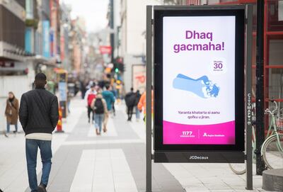 A billboard with information about coronavirus in Somali is seen, in a street with less pedestrian traffic than usual as a result of the coronavirus disease (COVID-19) outbreak in Stockholm, Sweden April 1, 2020. TT News Agency/Fredrik Sandberg via REUTERS      ATTENTION EDITORS - THIS IMAGE WAS PROVIDED BY A THIRD PARTY. SWEDEN OUT. NO COMMERCIAL OR EDITORIAL SALES IN SWEDEN.