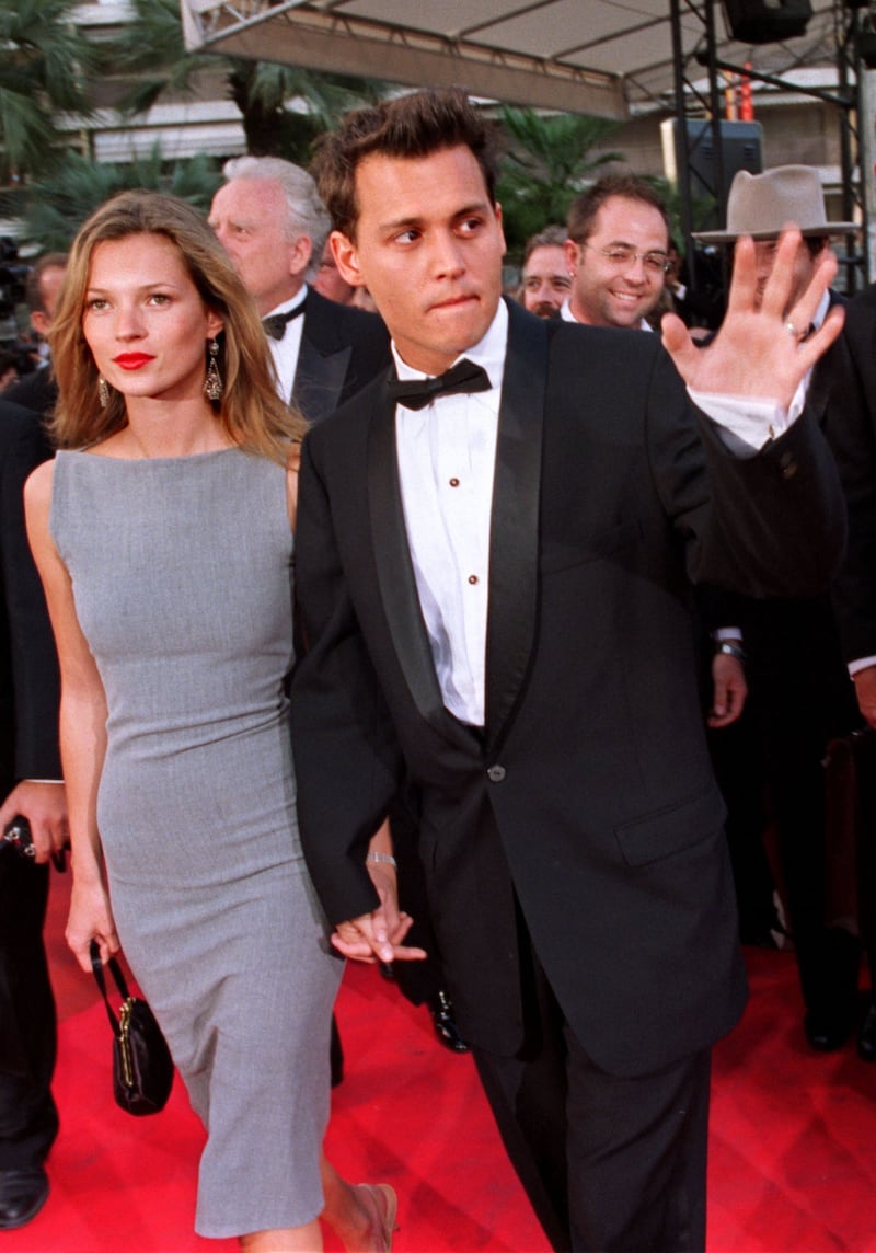 Johnny Depp and Kate Moss on the red carpet at the Cannes Film Festival for the screening of Depp's film 'The Brave', on May 10, 1997. Reuters