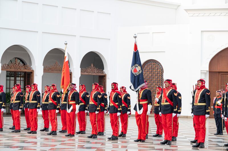 Members of the Bahraini Armed Forces perform a guard of honour at the palace. Photo: Abdulla Al Neyadi for the Ministry of Presidential Affairs