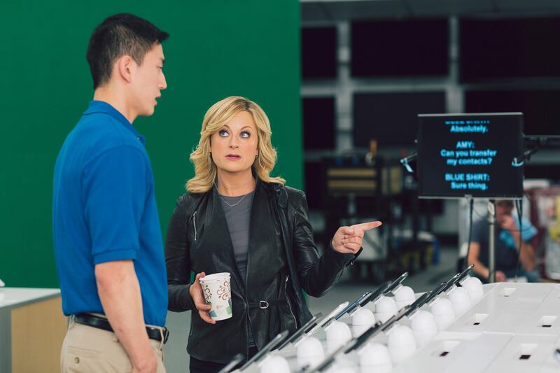 This undated image provided by Best Buy, shows Amy Poehler on the set of the Company's Super Bowl commercial.  Best Buy's 30-second ad in the first quarter stars Amy Poehler, star of NBC's "Parks and Rec," asking a Best Buy employee "lots of questions." (AP Photo/Best Buy) *** Local Caption ***  Best Buy Amy Poehler.JPEG-008a0.jpg