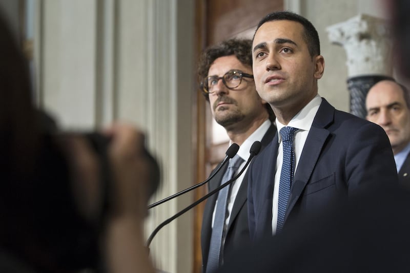 Luigi Di Maio, leader of the Five Star Movement, right, speaks at a news conference following his meeting with Italy's President Sergio Mattarella at the Quirinale Palace in Rome, Italy, on Monday, May 7, 2018. Mattarella is holding a new round of talks with parties in a final attempt to form a political government two months after inconclusive elections. Photographer: Giulio Napolitano/Bloomberg