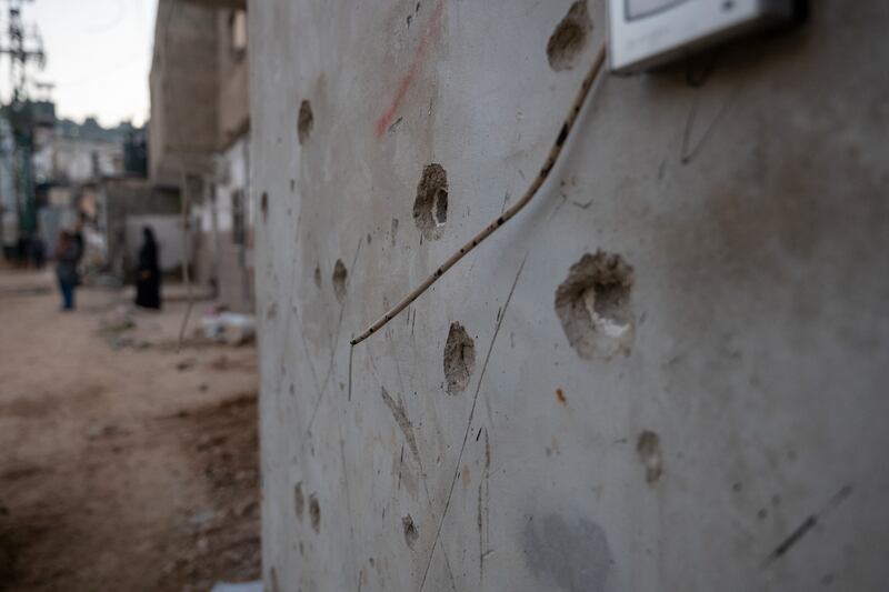 Bullet holes in a wall in Jenin, West Bank. Getty Images
