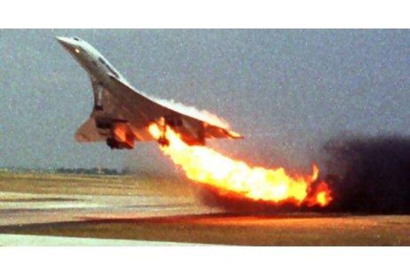 Air France Concorde Flight 4590 takes off with fire trailing from its engine on the left wing from Charles de Gaulle airport in Paris on July 25, 2000. Toshihiko Sato / AP Photo