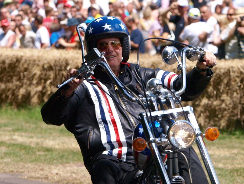 July 5, 2009:  Fonda drives past the crowd on the replica of the motorcycle he rode in the 1969 film, 'Easy Rider', at Goodwood's Festival of Speed in Goodwood, Southern England. AFP.