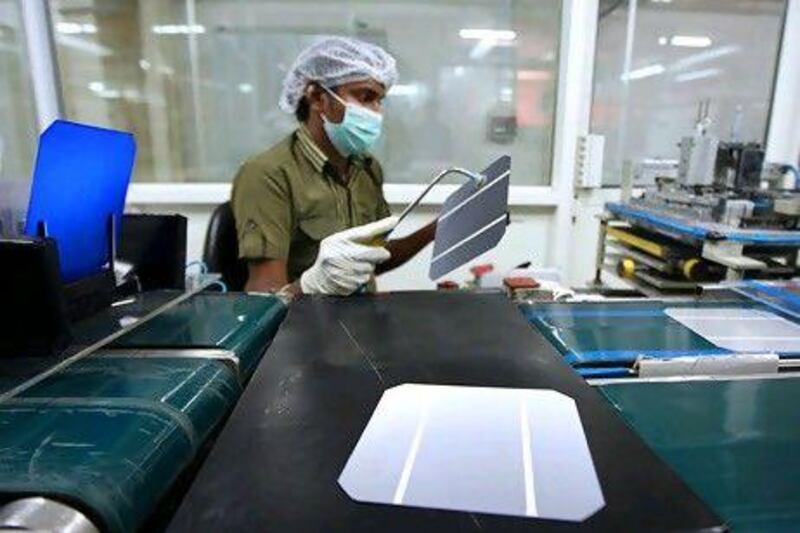 Anti-reflection coating and metallisation process of solar cells is carried out at the Microsol solar panel factory in Fujairah. Pawan Singh / The National