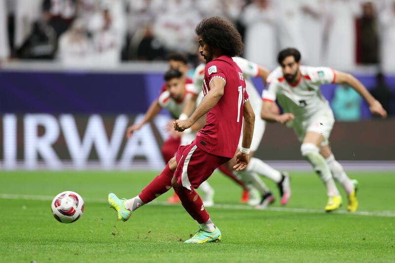 Akram Afif of Qatar scores his team's winner from the penalty spot. Getty Images