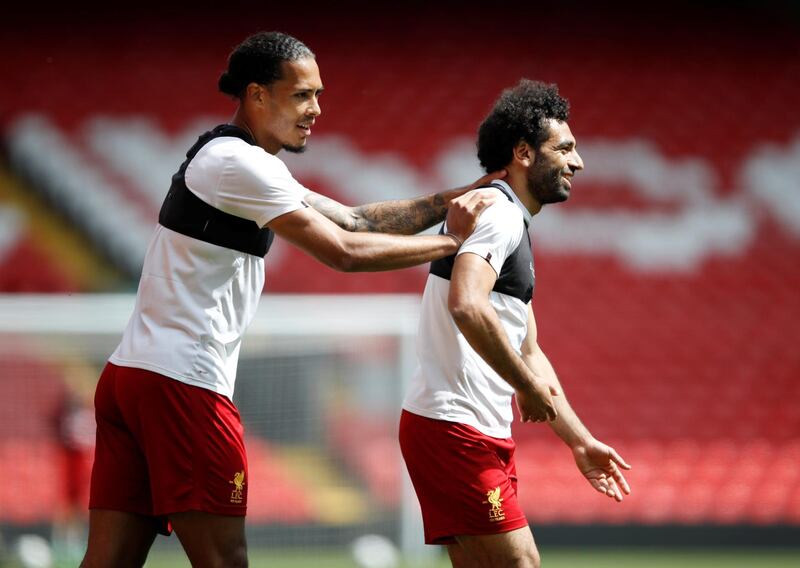 Liverpool's Virgil van Dijk and Mohamed Salah during training. Andrew Yates / Reuters