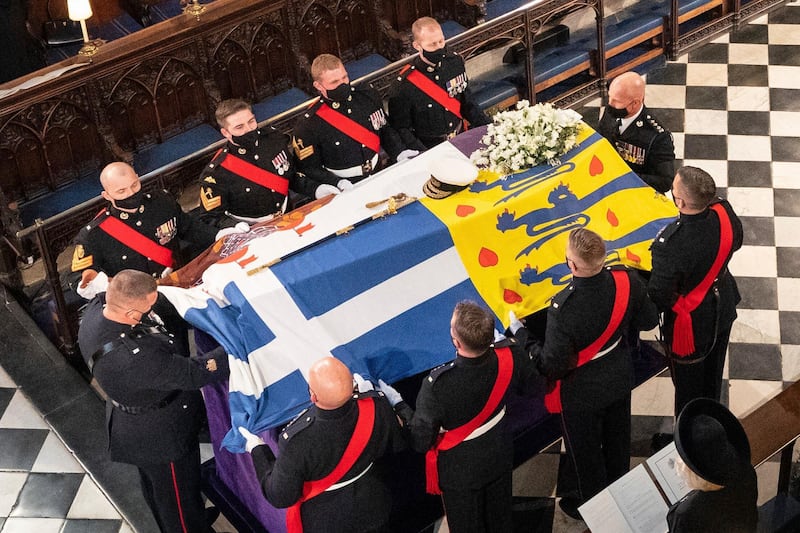 Pallbearers carry the coffin of the Duke of Edinburgh during his funeral, at St George's Chapel in Windsor Castle. Prince Philip died April 9 at the age of 99. AP