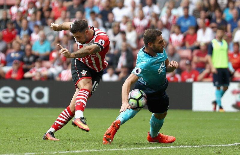 Charlie Austin of Southampton scores his side’s first goal against Swansea City. Bryn Lennon / Getty Images