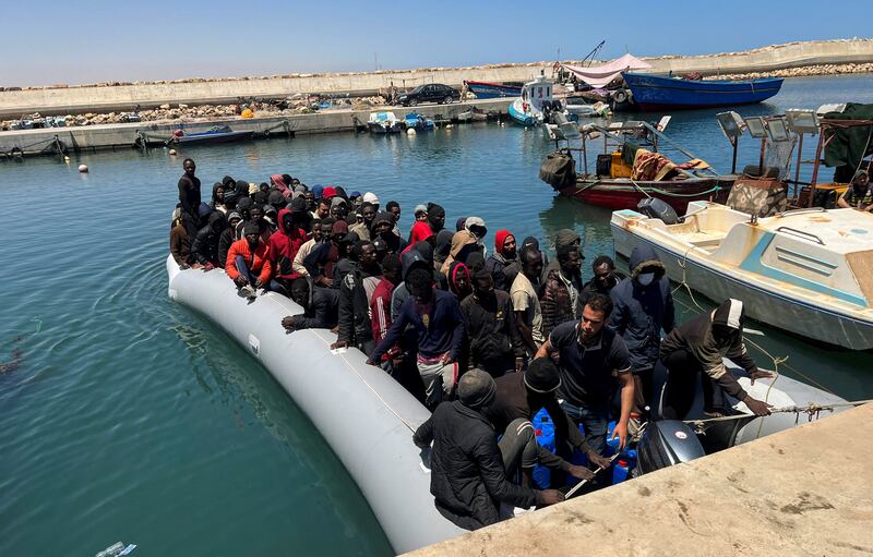Migrants rescued by Libyan Coast Guards in the Mediterranean Sea arrive in Garaboli on May 23, 2022. Reuters