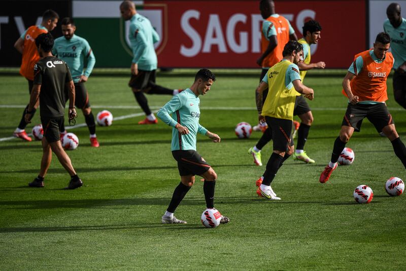 Portugal's Cristiano Ronaldo alongside teammates at training. EPA