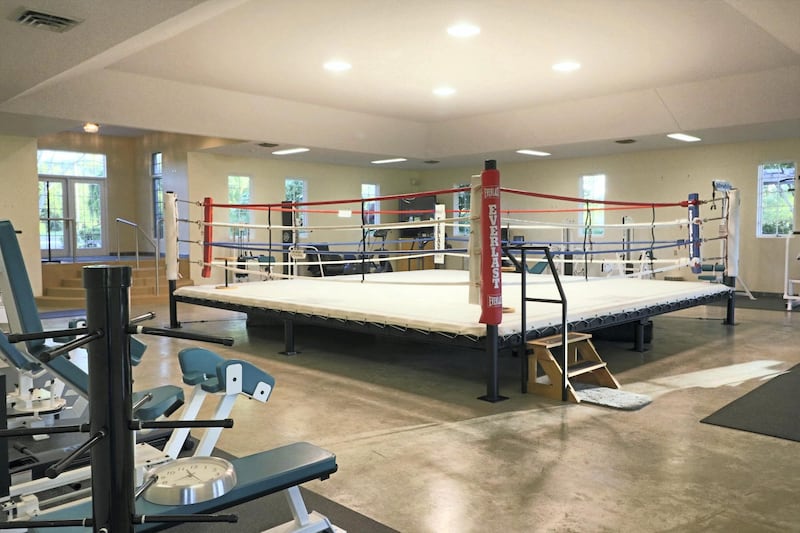 Standing proud at the centre of a sprawling gym is a canvas-padded boxing ring, complete with ropes, posts and steps. Ali had the full-sized platform specially installed for his own practice sessions when he bought the house, and refurbished it in the 1990s. Toptenrealestatedeals.com