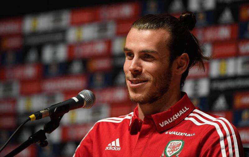 Wales player Gareth Bale faces the media during the Wales press conference ahead of their UEFA Euro 2016 semi final against Portugal at College Le Bocage on July 4, 2016 in Dinard, France.  (Photo by Stu Forster/Getty Images)