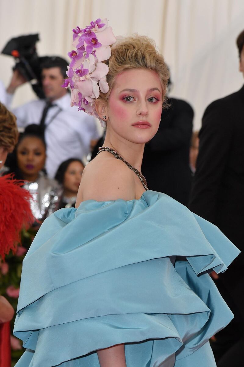 Actress Lili Reinhart took inspiration from the courts of Marie Antoinette, judging by the hot-pink blush, blended high on to the cheeks and temples. AFP