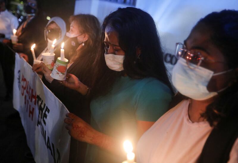 Angelia Pranthaman, sister of Pannir Selvam Pranthaman, another Malaysian drug trafficker facing death sentence, cries at the vigil for Nagaenthran Dharmalingam in Kuala Lumpur. Reuters