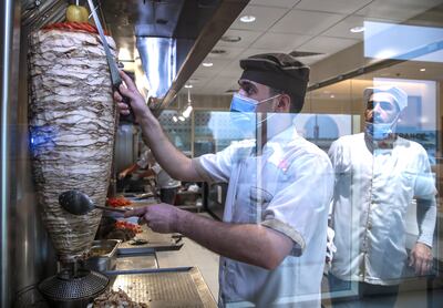 Shawarma being prepared at Qalat Baalbak restaurant. Victor Besa / The National