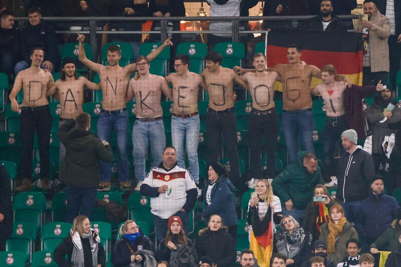 Germany fans show a thank you message for former Germany head coach Joachim Low. AFP