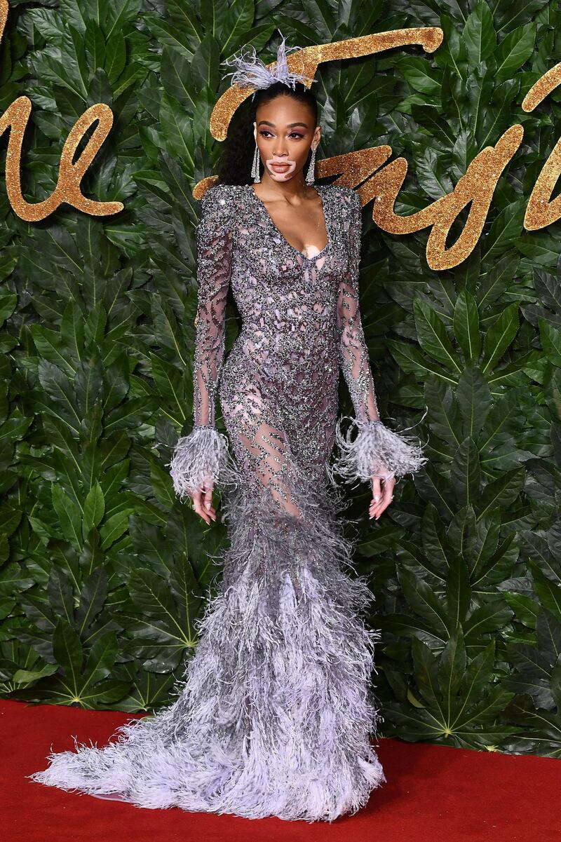 LONDON, ENGLAND - DECEMBER 10:  Winnie Harlow arrives at The Fashion Awards 2018 In Partnership With Swarovski at Royal Albert Hall on December 10, 2018 in London, England.  (Photo by Jeff Spicer/BFC/Getty Images for BFC)