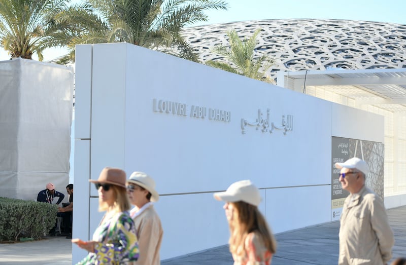 Visitors explore Louvre Abu Dhabi. The emirate's new investment plan will help transform perceptions of Gulf travel from one dominated by glitz and glamour to one that is also culturally enriching, sustainable and – importantly – affordable. Khushnum Bhandari / The National