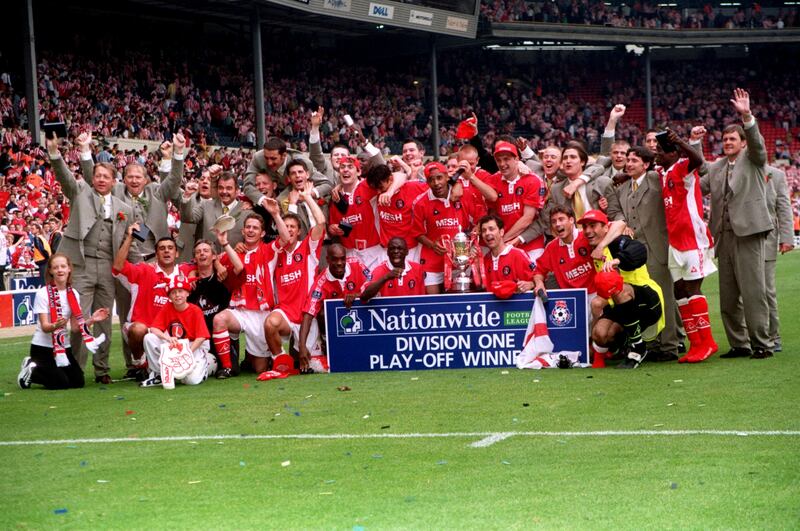 Charlton Athletic celebrate with the Championship play-off trophy. Getty